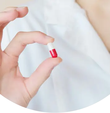 Nurse with pill vertical